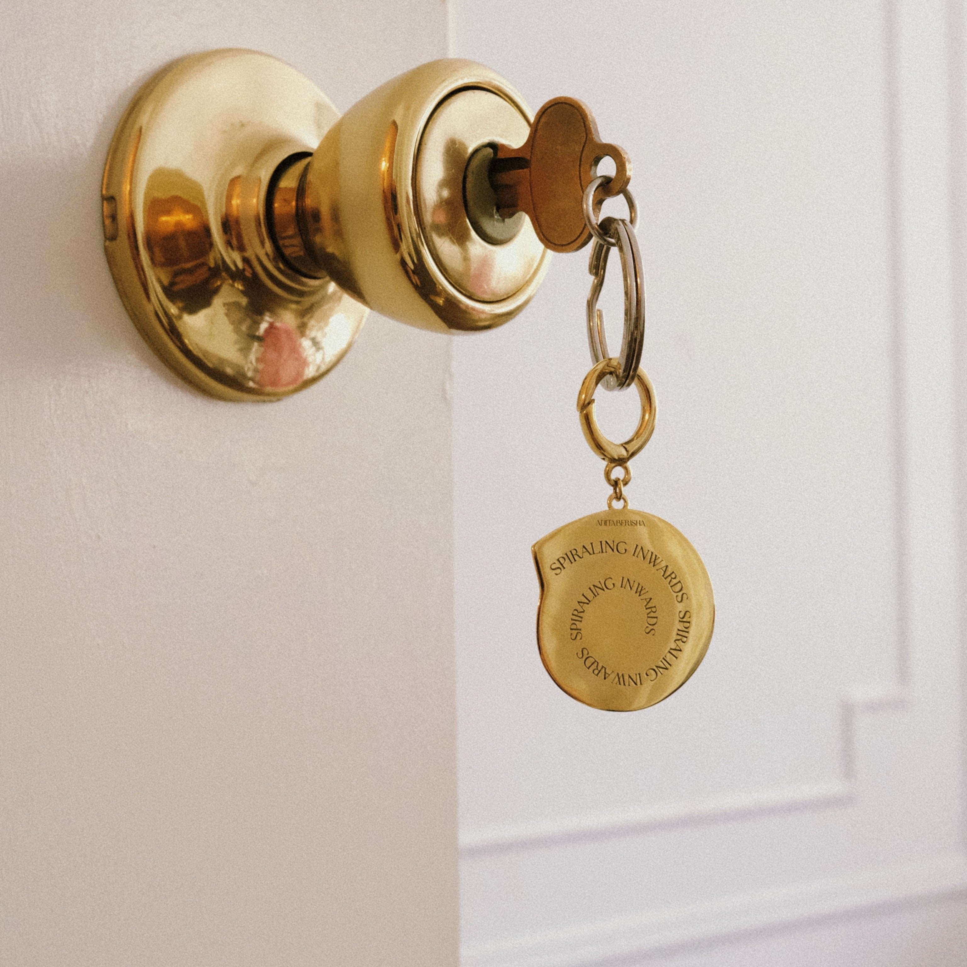 Spiraling Inwards Key Charm by Anita Berisha - At Present Jewelry