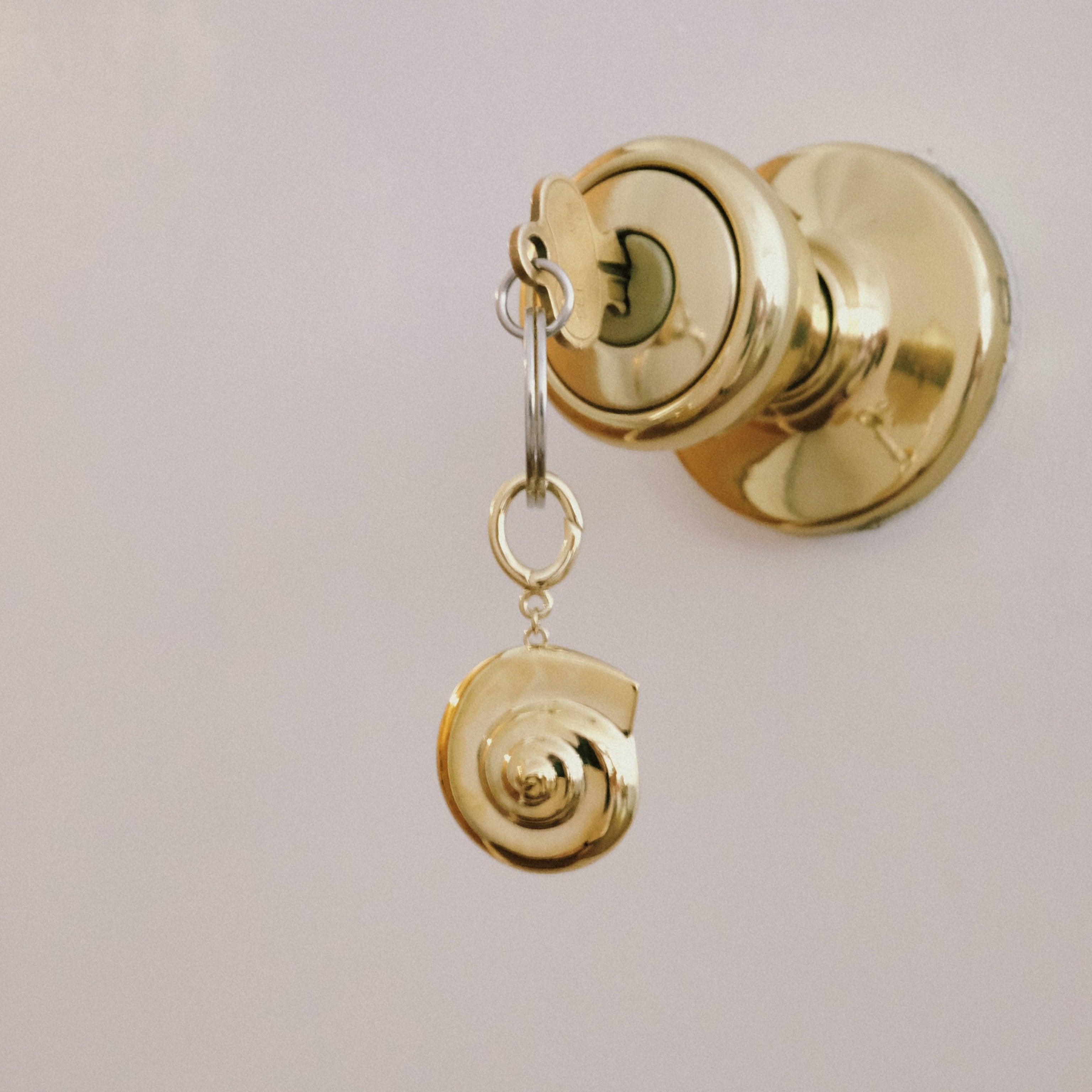 Spiraling Inwards Key Charm by Anita Berisha - At Present Jewelry