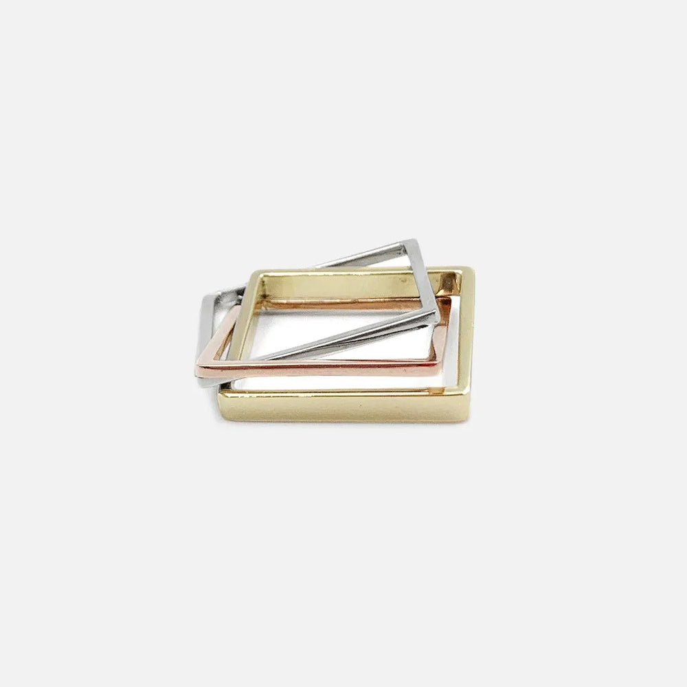 Three Band Puzzle Ring in Yellow, White and Rose Gold by Leslie Paige Jewelry - At Present Jewelry