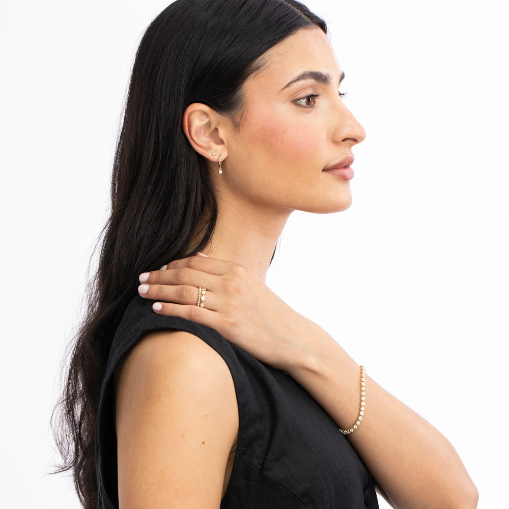 Single Diamond Raindrop Huggies - At Present Jewelry