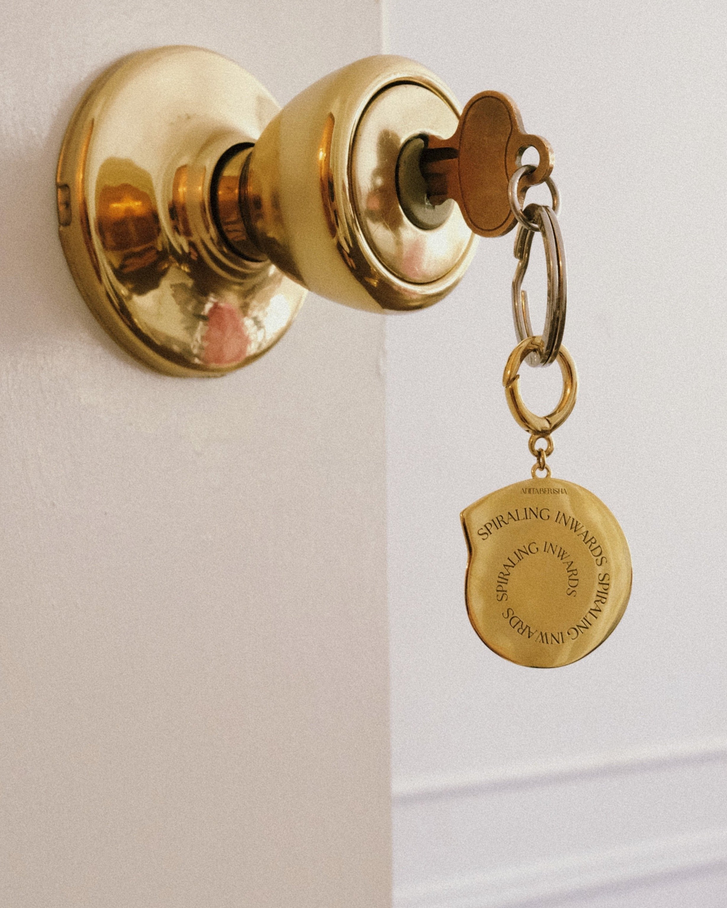 Spiraling Inwards Key Charm by Anita Berisha - At Present Jewelry