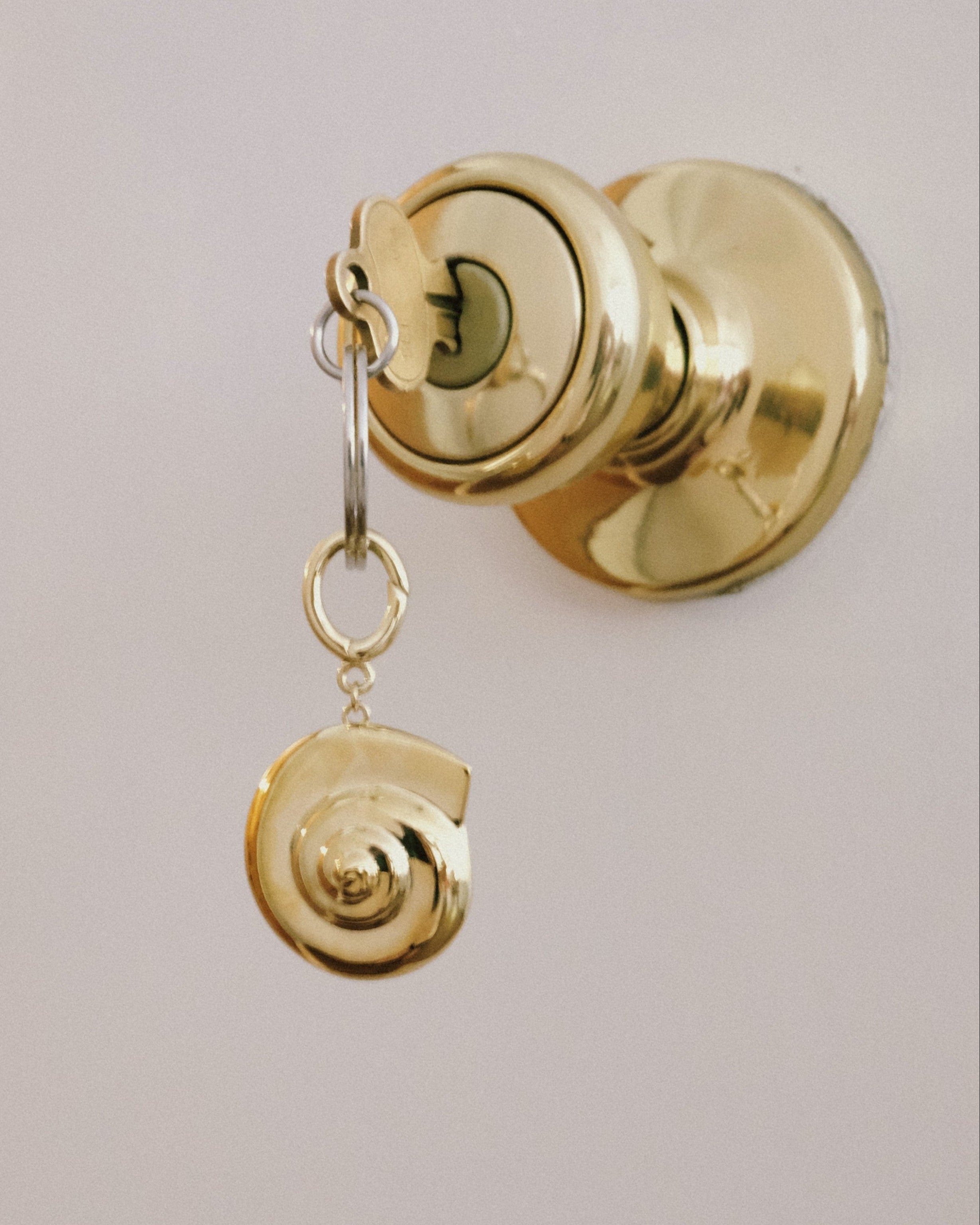 Spiraling Inwards Key Charm by Anita Berisha - At Present Jewelry