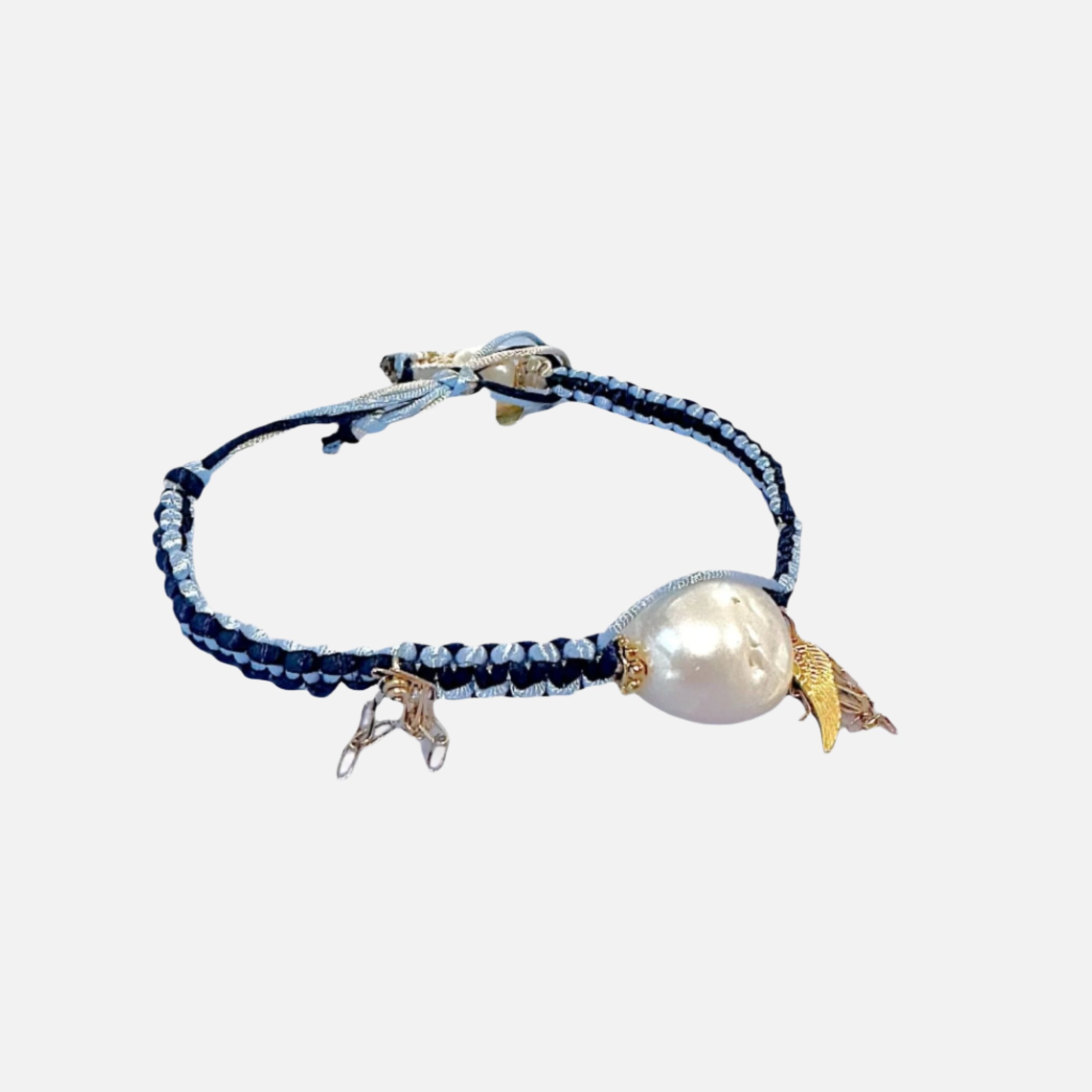 Woven blue anklet with pearls and gold accents