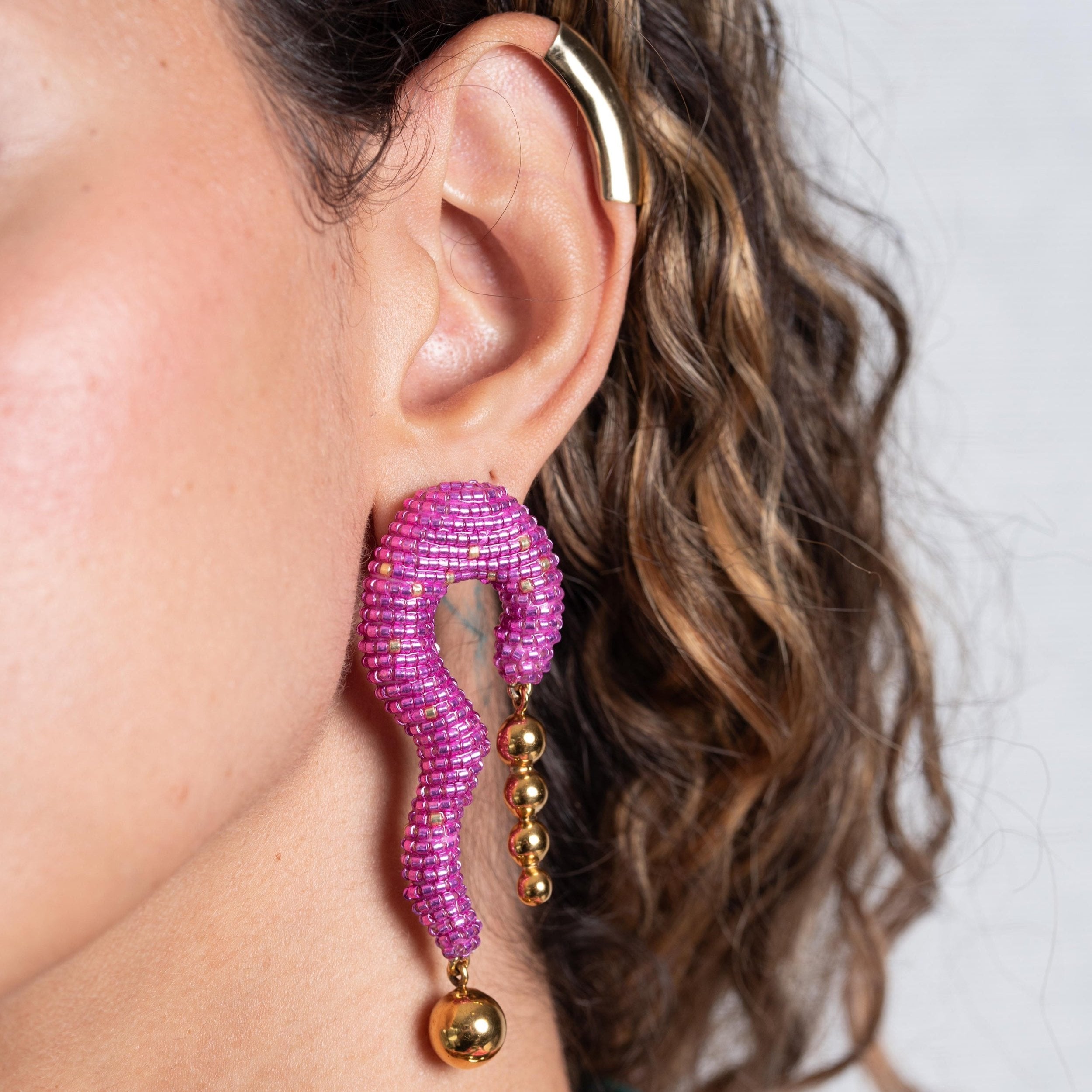 Pink beaded earring with silver ear cuff