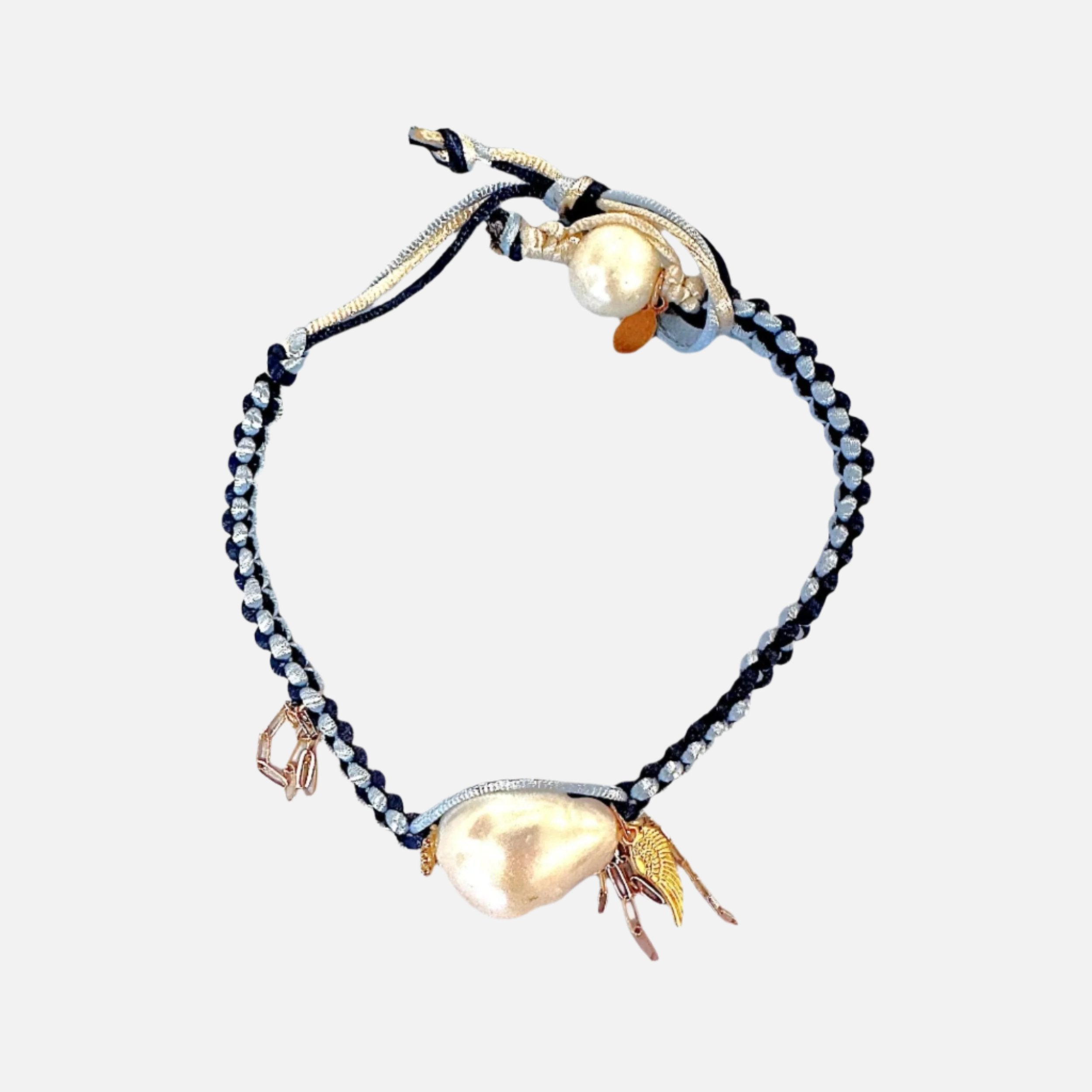 Woven blue anklet with pearls and gold accents